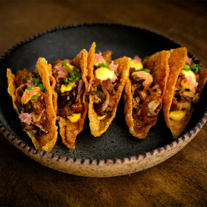 ork Sisig Tacos, Saffron & Chilli Emulsion, Lemon Myrtle, Finger Lime